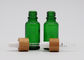 タケ点滴器の印刷のピペットが付いている緑オイル18mmの化粧品のガラス点滴器のびん