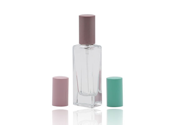 15ml化粧品のスプレーのびん、厚い壁の多彩な帽子が付いている詰め替え式の空のガラス香水瓶